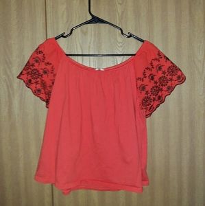 Medium Off the shoulder orange tunic featuring floral accent sleeve details